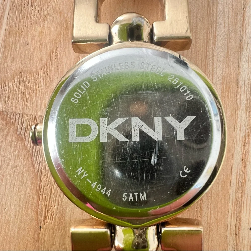 DKNY ladies gold tone crystal studded bracelet watch NEW BATTERY